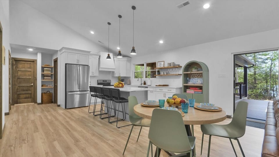 Dining table and kitchen island—perfect for shared meals and gatherings.