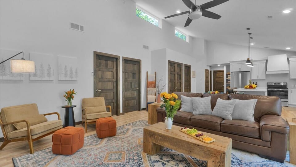 Direct access to all main areas—bedrooms, dining, and kitchen.