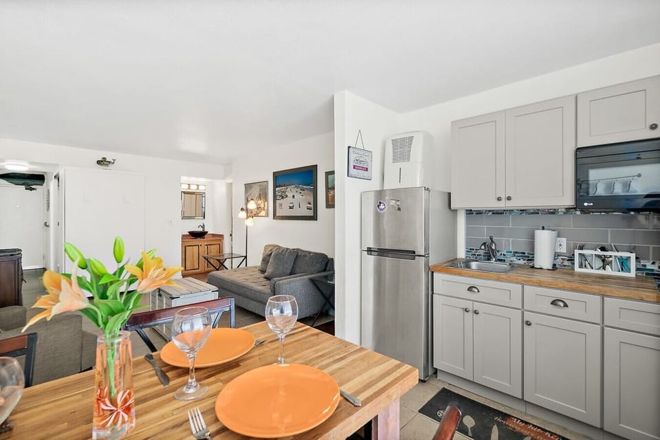 Compact kitchen setup with dining space and easy access to the living area.