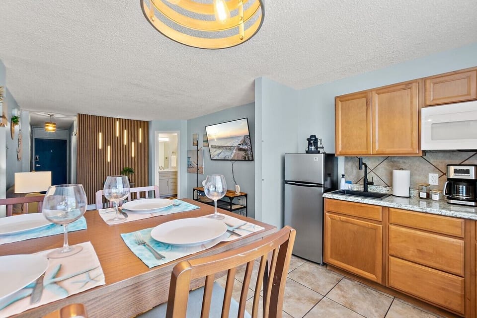 Community pool area with beach views and plenty of space to relax.