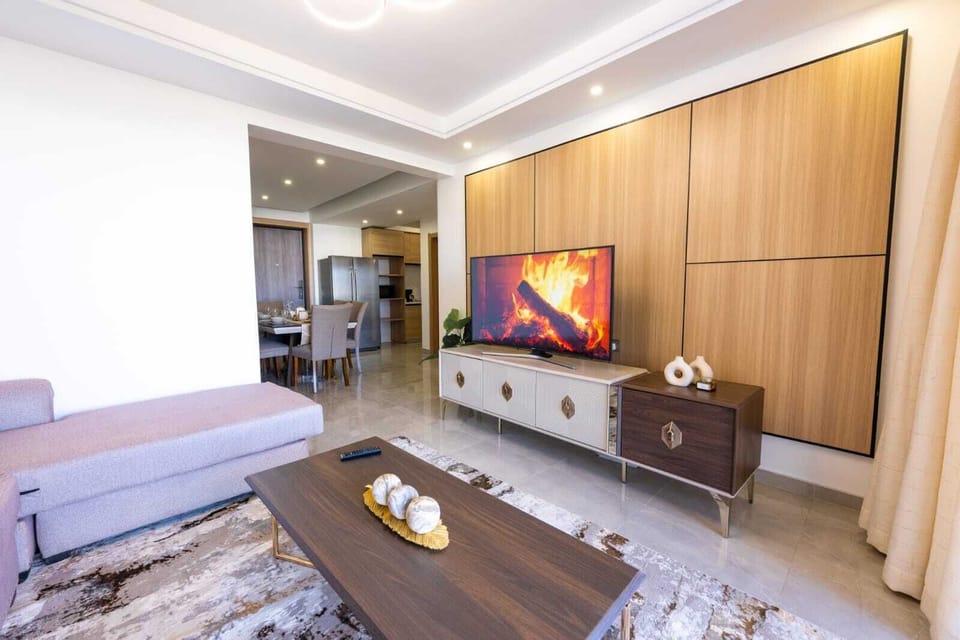 55-inch Smart TV with cable channels, Netflix, first-run movies