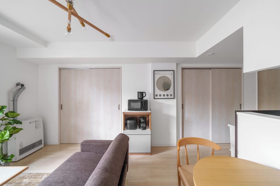 Apartment | Living area | 42-inch flat-screen TV with digital channels