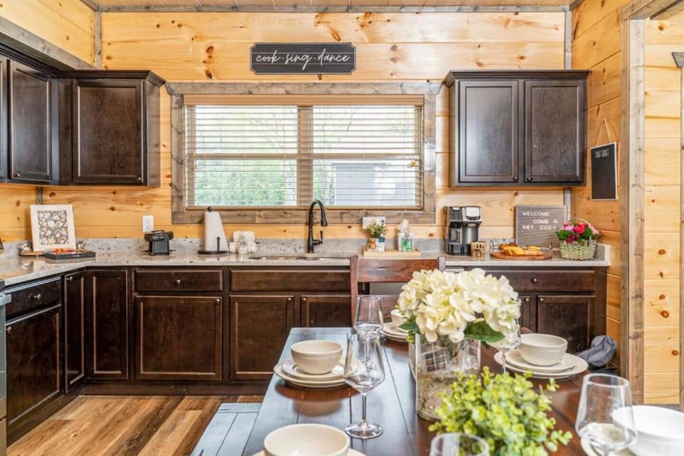 Kitchen: Whip up delicious meals in this stunning kitchen with modern amenities and rustic charm!