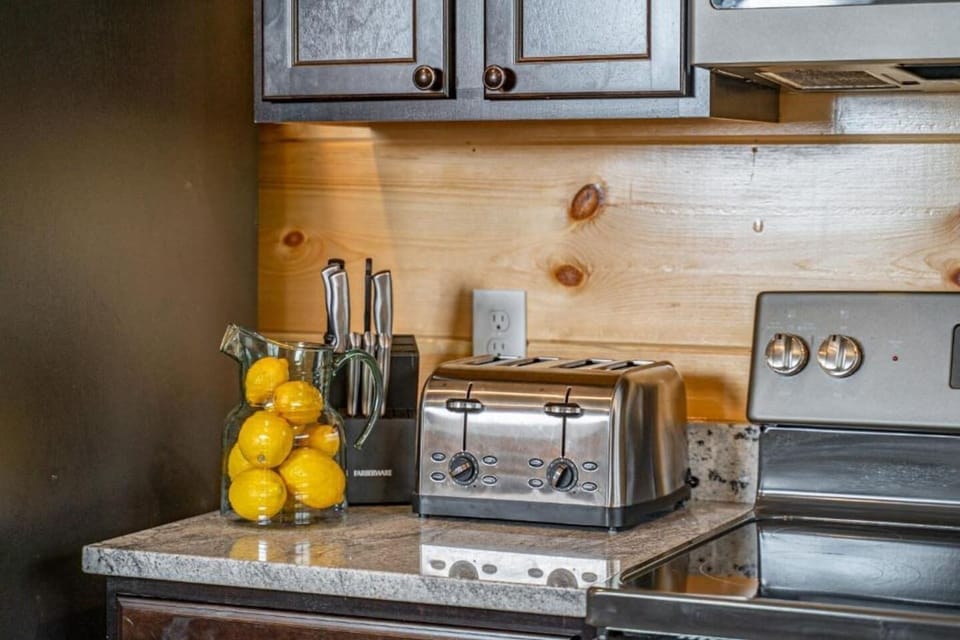 Kitchen: Whip up culinary delights in this stylish space with modern appliances and rustic charm!