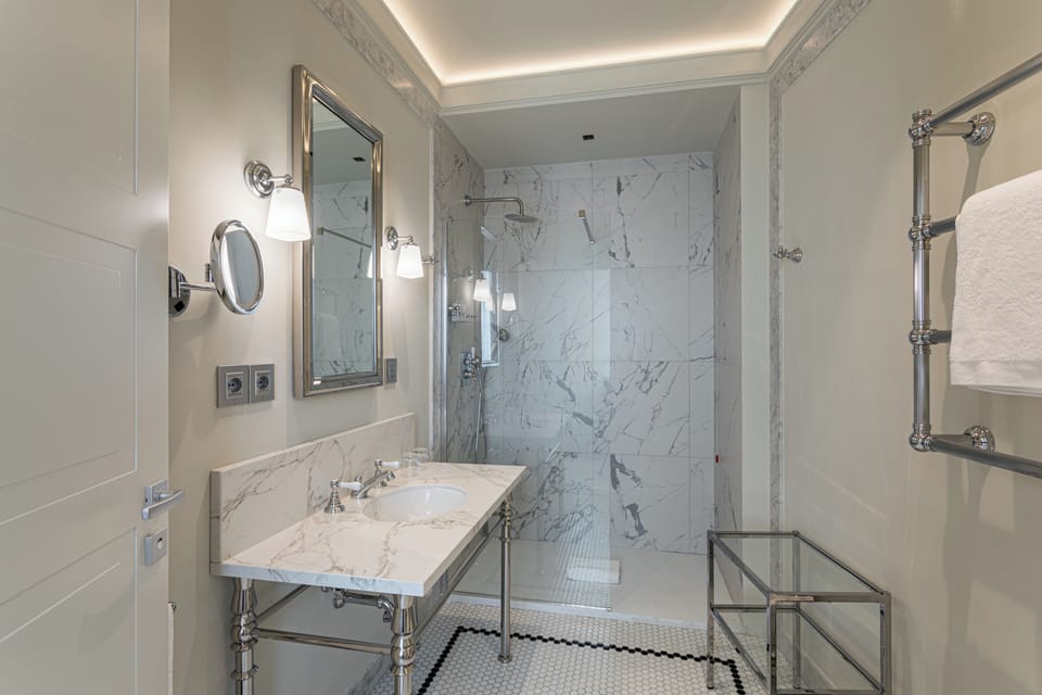 Deluxe Room, Terrace | Bathroom | Shower, free toiletries, hair dryer, slippers