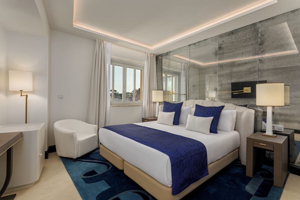 Superior Room | Minibar, in-room safe, desk, blackout drapes