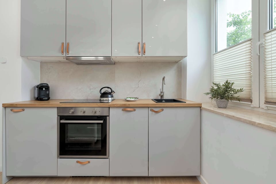 Modern kitchenette equipped with everything needed for preparing meals during your stay.
