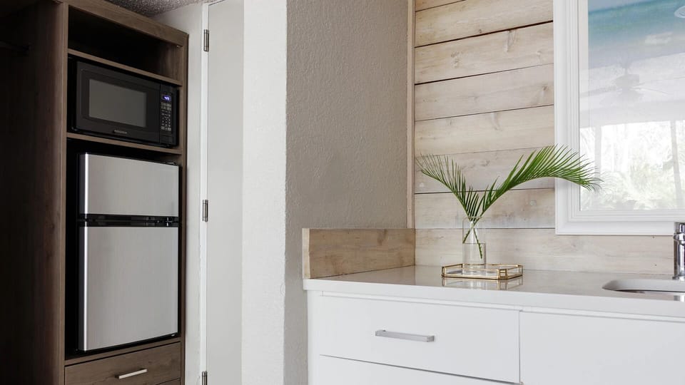 Stock snacks and chill drinks in the convenient kitchenette.