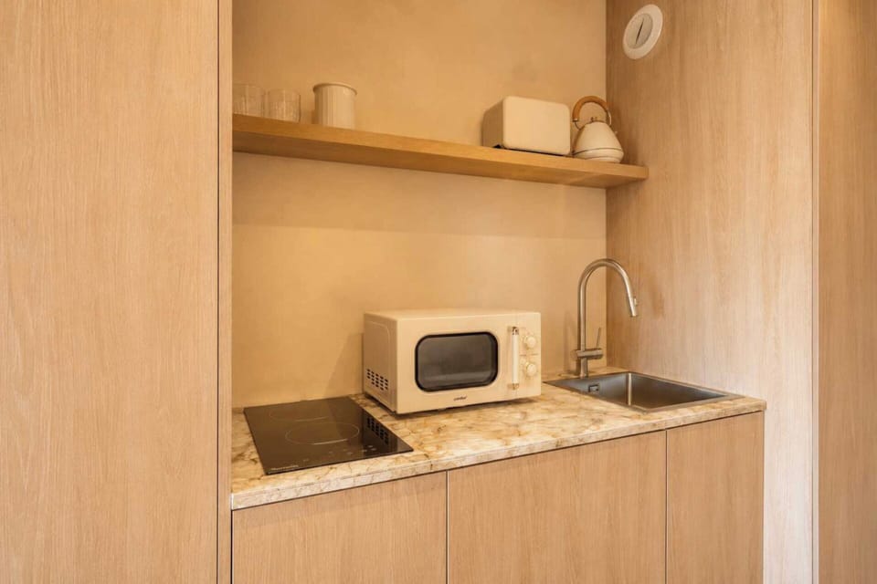 Apartment | Private kitchen | Coffee/tea maker, fridge, microwave, stovetop