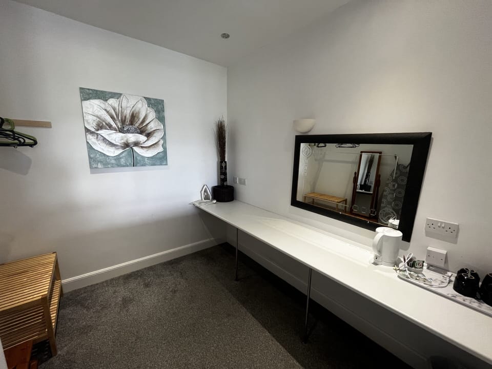 Family Twin Room, City View | Desk, blackout drapes, iron/ironing board (on request), WiFi (free)