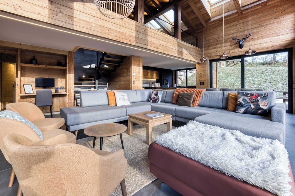 Spacious & comfortable living space. Lying in the couch, you can see all the Mountains. No words can describe the beauty of the place.