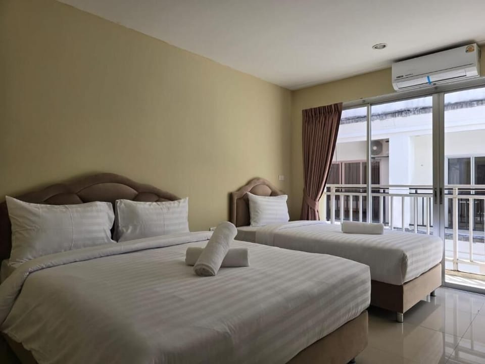 Triple Room, Balcony, City View | In-room safe, free WiFi