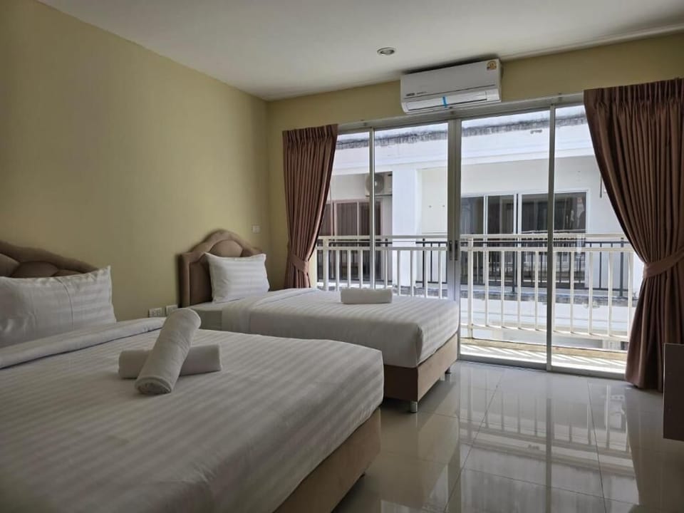 Triple Room, Balcony, City View | In-room safe, free WiFi