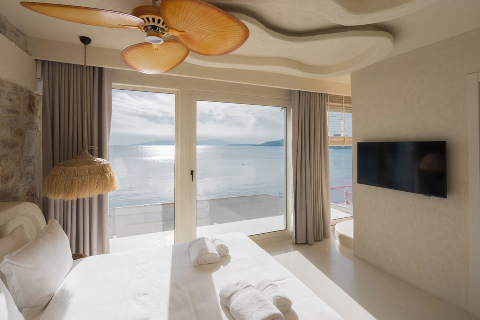 Deluxe Room, Balcony, Sea View | Iron/ironing board, free WiFi