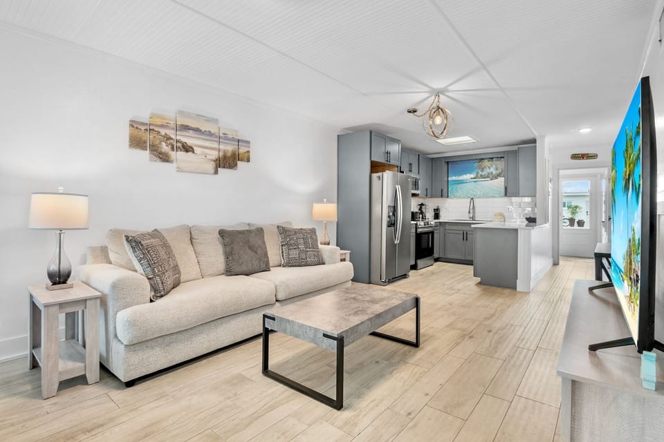 Living Room with Plush Seating and TV