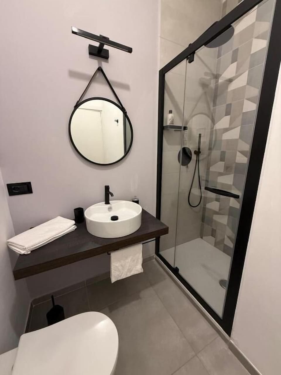 Deluxe Quadruple Room, Balcony, City View | Bathroom | Hair dryer, bidet, towels, soap