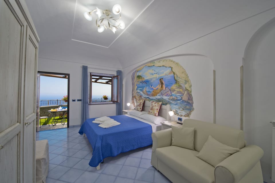 Comfort Triple Room, 1 Bedroom, Ocean View | Desk, soundproofing, free WiFi, bed sheets