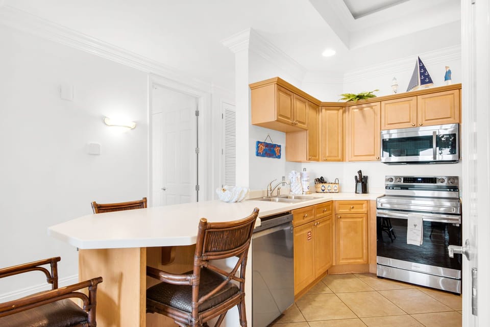 Enjoy a cozy breakfast bar where you can savor your morning coffee or prepare meals with ease.