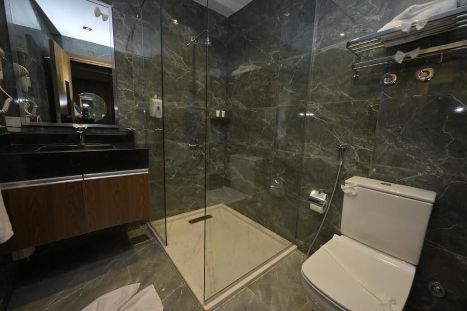 Hair dryer, slippers, towels, soap