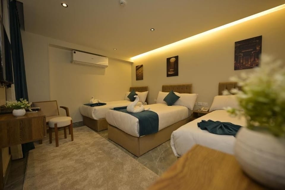 Luxury Triple Room, Balcony, City View | In-room safe, soundproofing, free WiFi