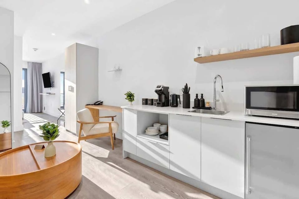 Convenient kitchenette equipped with dining essentials.