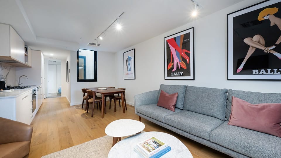 Light-filled open-plan living and dining area designed for comfort and relaxation.