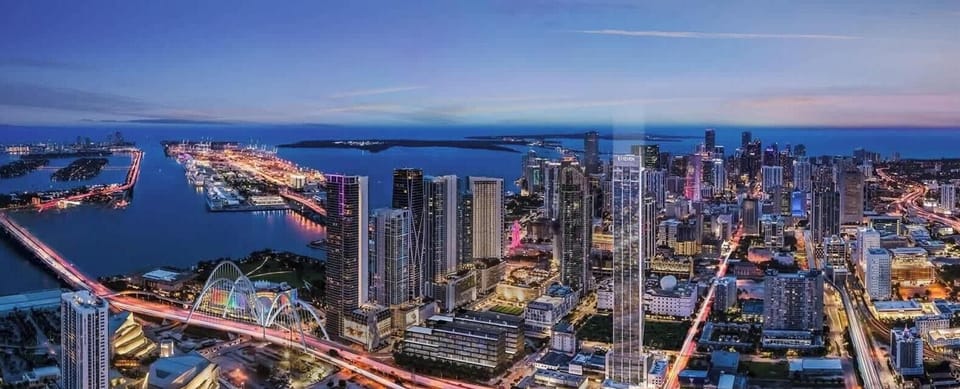 Mesmerizing city lights view from the property at twilight.