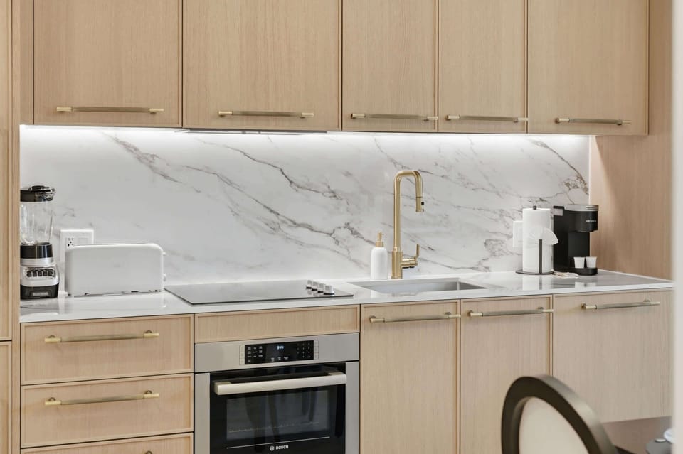 Premium quartz countertops and high-end built-in appliances.