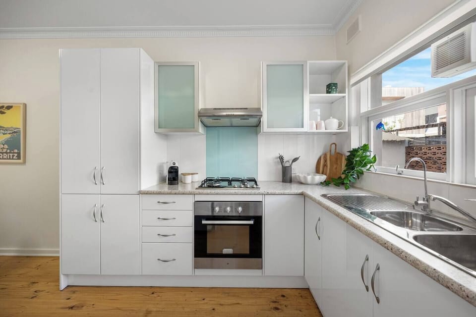 Start your day with freshly brewed espresso before strolling across the road to Henley Beach for an early morning walk along the shoreline.