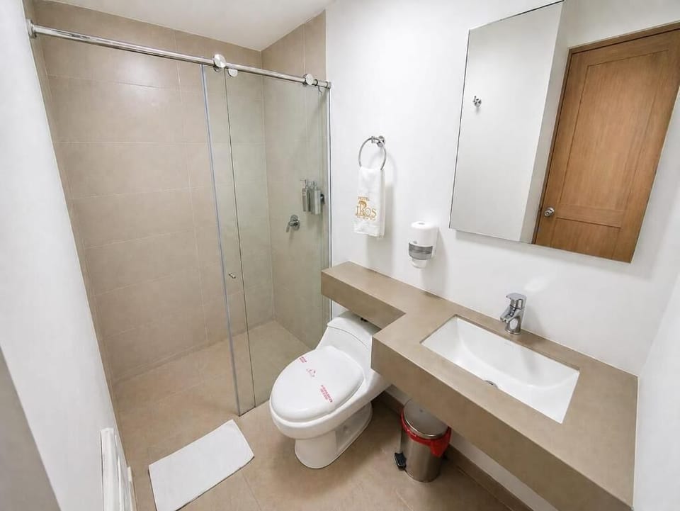 Twin Room | Bathroom | Shower, free toiletries, towels, soap