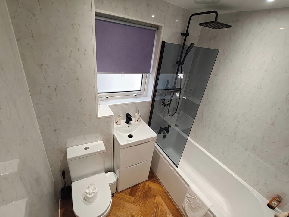 Combined shower/tub, deep soaking tub