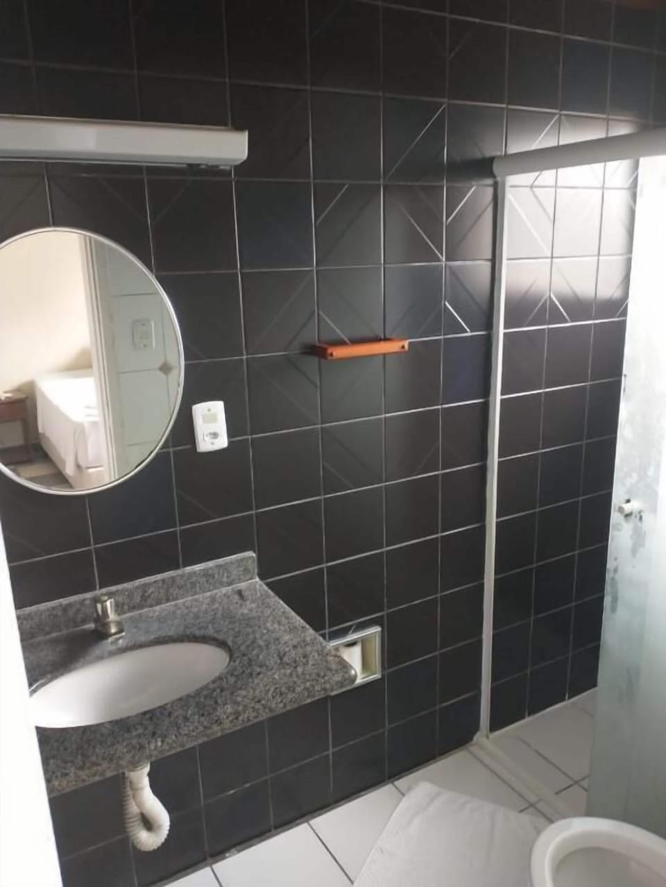 Shower, towels, soap, toilet paper