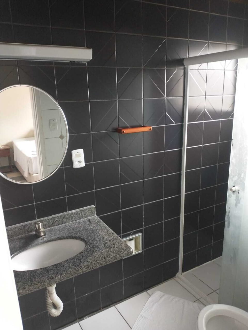 Shower, towels, soap, toilet paper