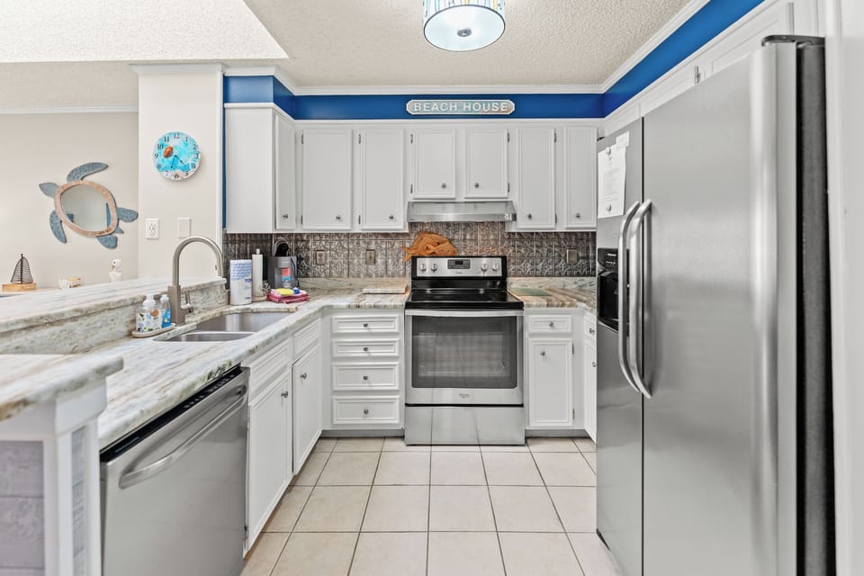 Beautiful updated kitchen with new appliances, stone counter tops