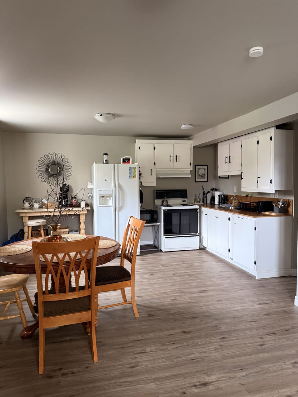 Spacious eat-in kitchen with full appliances and cozy dining space