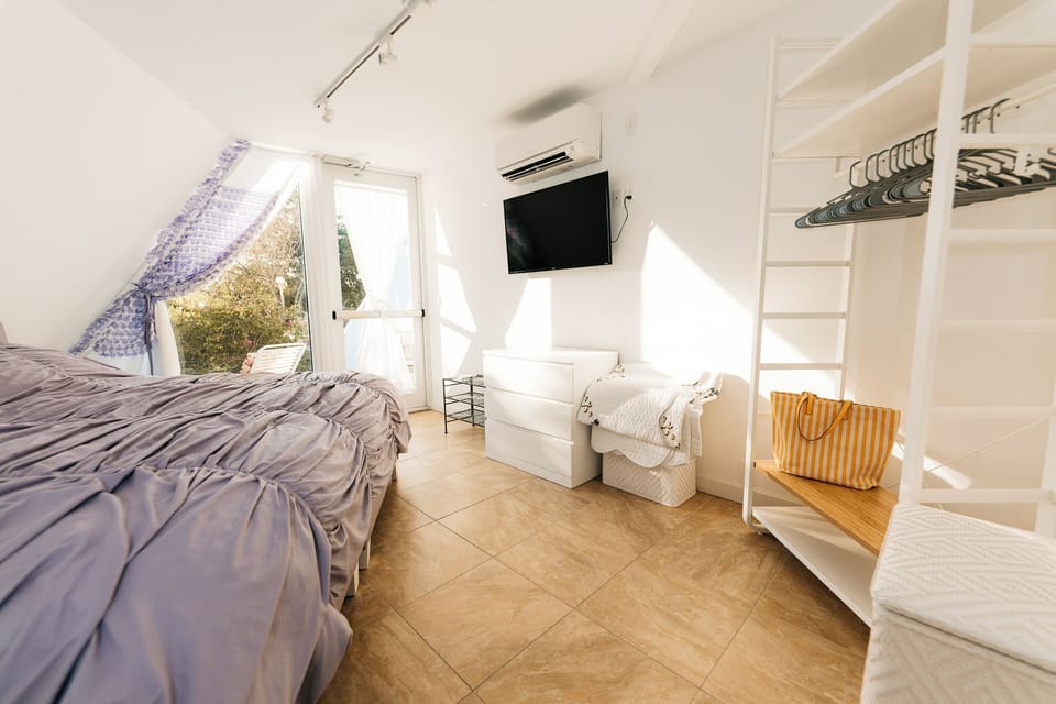 Bedroom. Interior and views may vary based on availability.