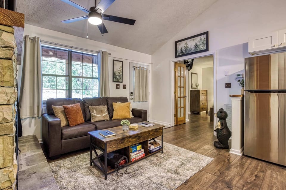 This inviting living room sits just outside the king bedroom, creating a cozy space to relax by the fireplace or stream your favorite shows after a day of exploring.