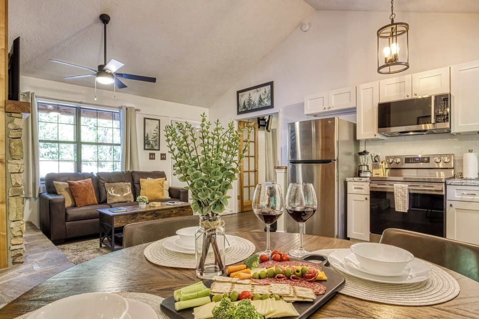 The open floor plan makes it easy to cook, dine, and relax together, creating the perfect setting for memorable mountain getaways.