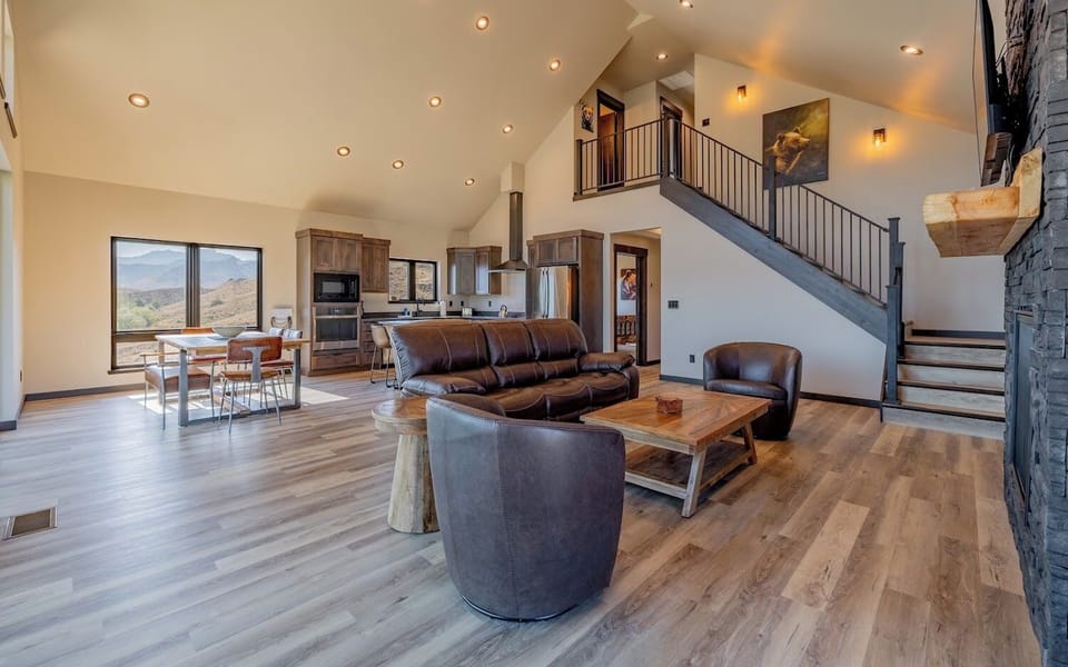 The open living, kitchen and dining area on the main level invite you to gather together