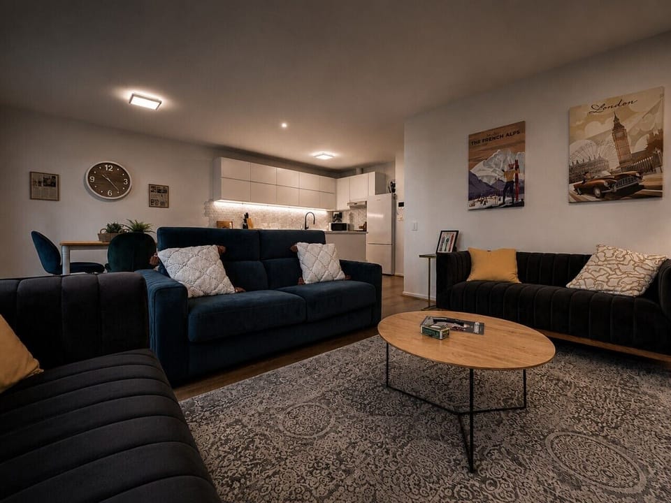 The living room has a smart HD TV, decorous reading material, and plush sofas, including a fold-out sofa bed (advance notice is required if you would like to have the sofa bed made up for your stay).