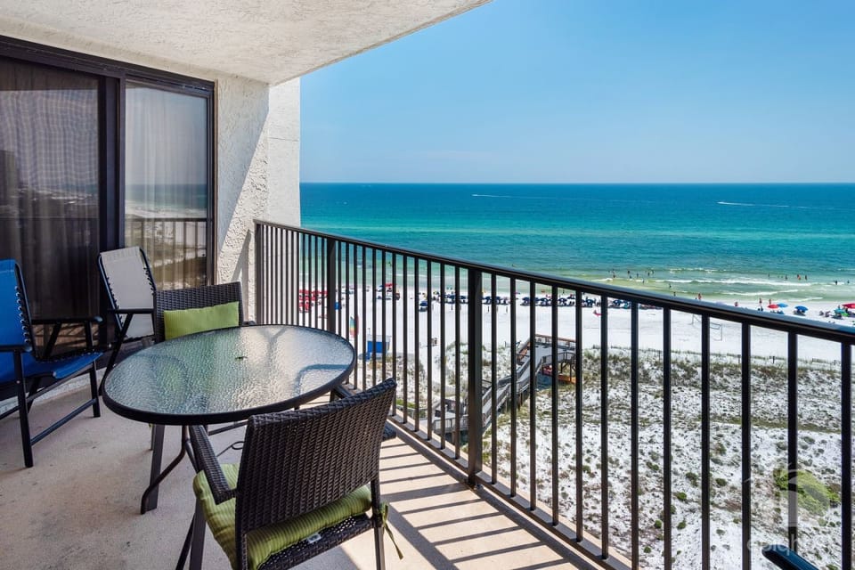 Private 10th-floor balcony with panoramic emerald gulf views