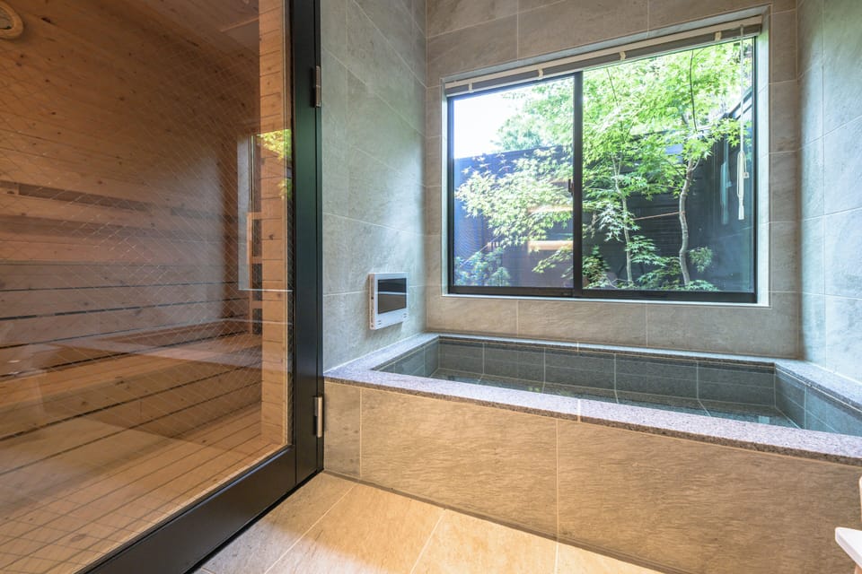 Deluxe Villa | Bathroom | Separate tub and shower, hydromassage showerhead