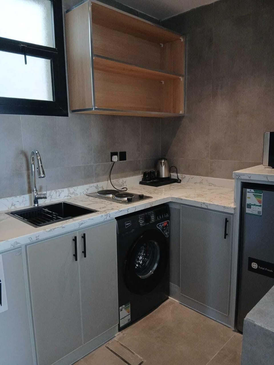 Mini-fridge, microwave, eco-friendly cleaning products, paper towels