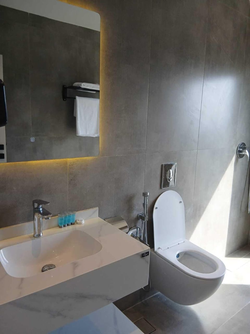 Superior Suite, City View | Bathroom | Separate tub and shower, rainfall showerhead, free toiletries