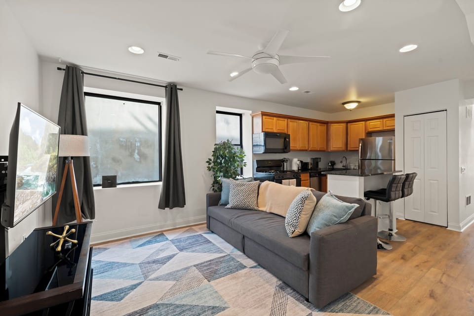 Apartment, 2 Bedrooms | Living area | 55-inch Smart TV with digital channels, streaming services