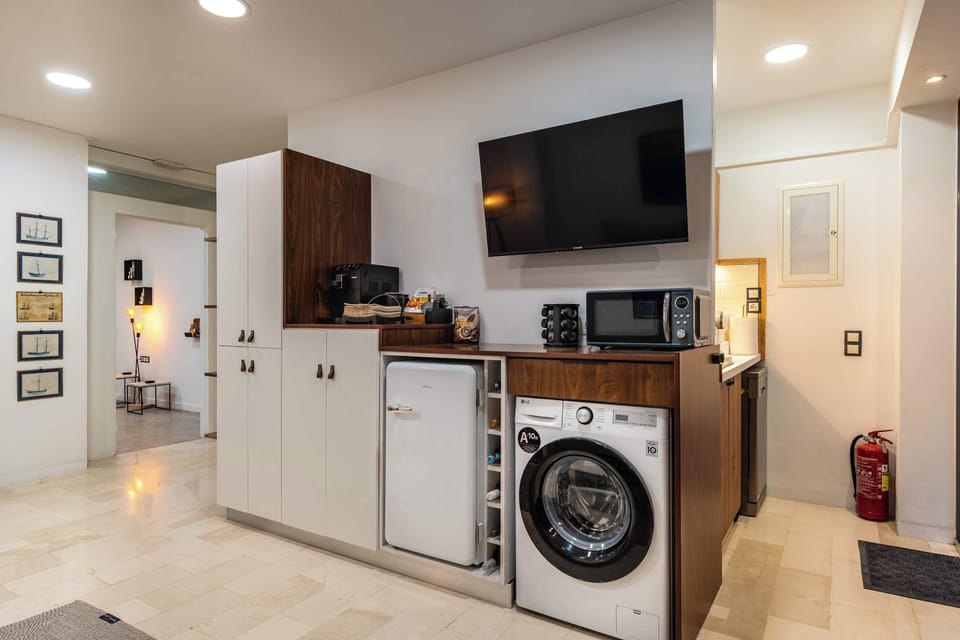 The studio's flexible layout allows guests to relax, dine, and unwind in one bright and carefully designed living space.