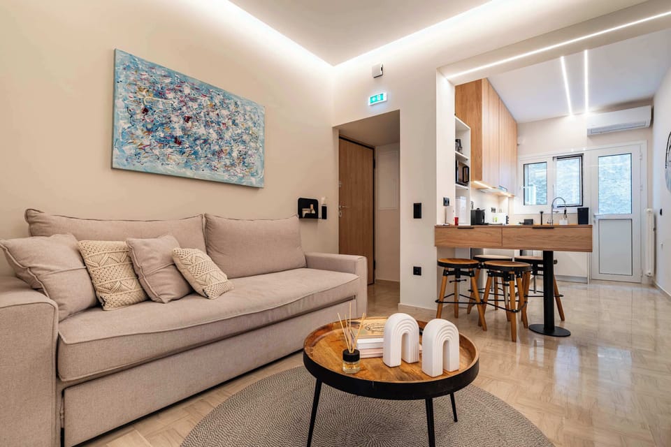The open layout connects the living, dining, and kitchen areas, creating a comfortable setting for spending time together throughout your stay.