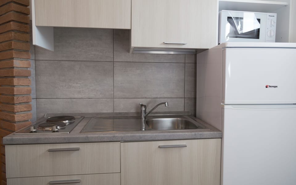 Panoramic Apartment, 1 Bedroom, Partial Sea View | Private kitchen | Mini-fridge