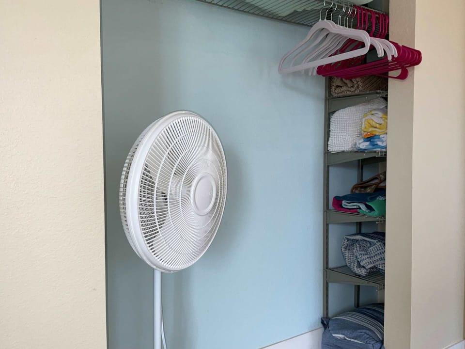 Keep clothes & bags tucked away in the king bedroom closet​