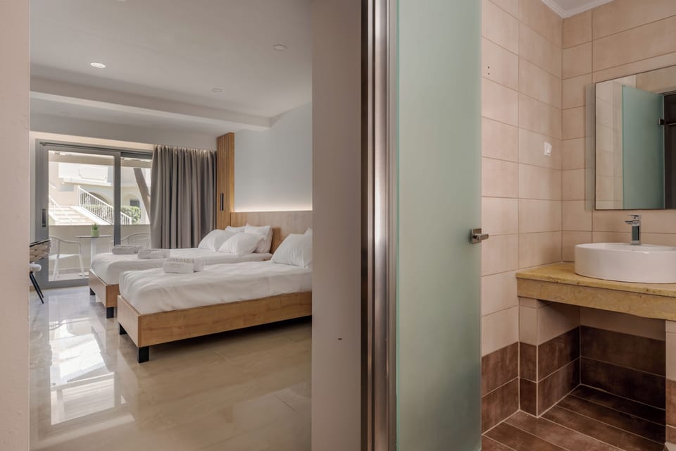 Superior Triple Room, Garden View, Ground Floor | In-room safe, desk, blackout drapes, iron/ironing board
